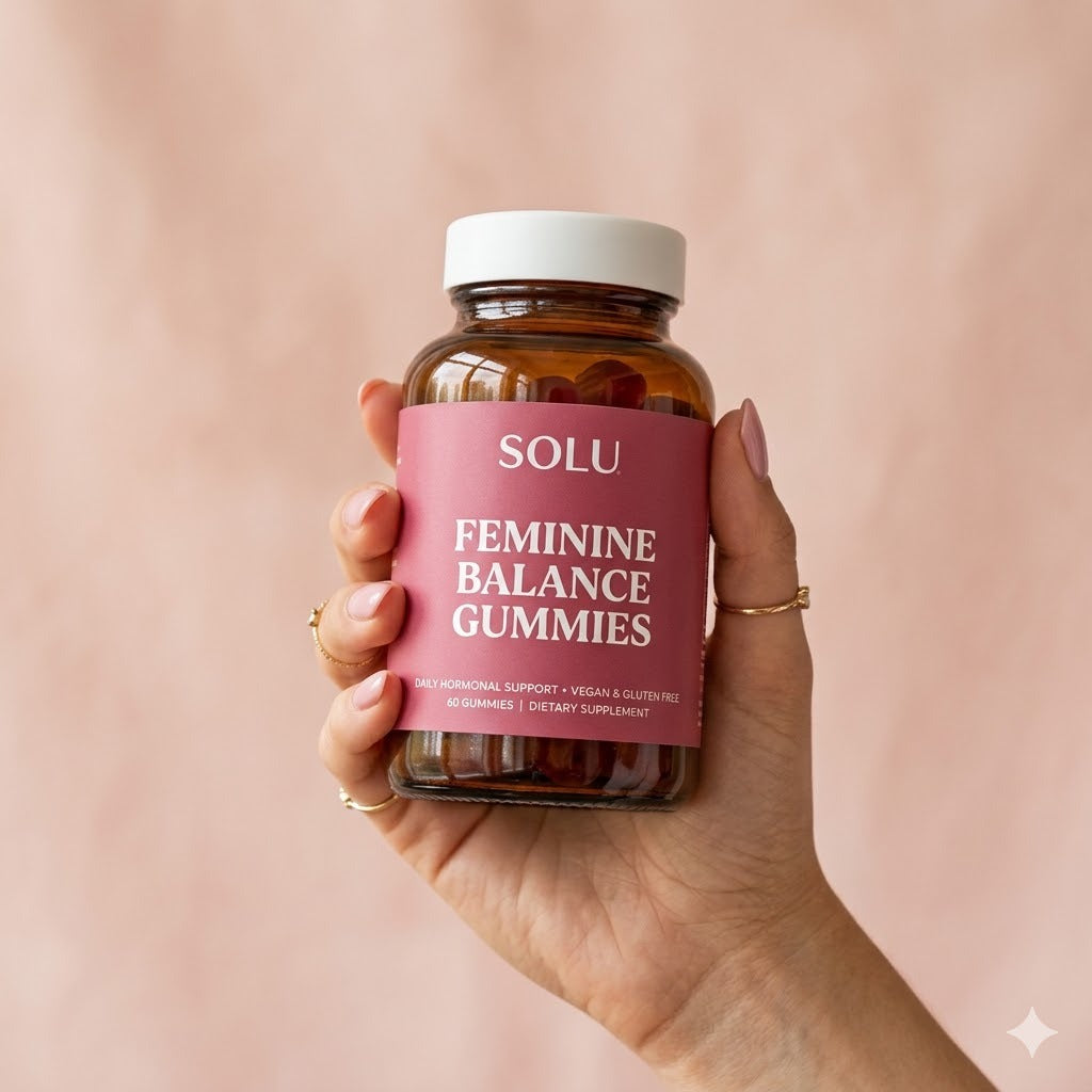Solu Feminine Balance Gummies held in hand — daily feminine wellness gummy